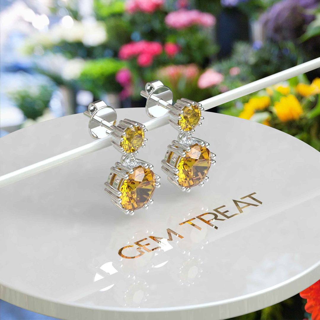 Sunburst Splendor: Delicate Round Citrine Drop Earrings for Enchanting Charm.