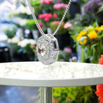 Load image into Gallery viewer, Blush Harmony: Round Morganite Solitaire Pendant Necklace Adorned with Double Moissanite Halo
