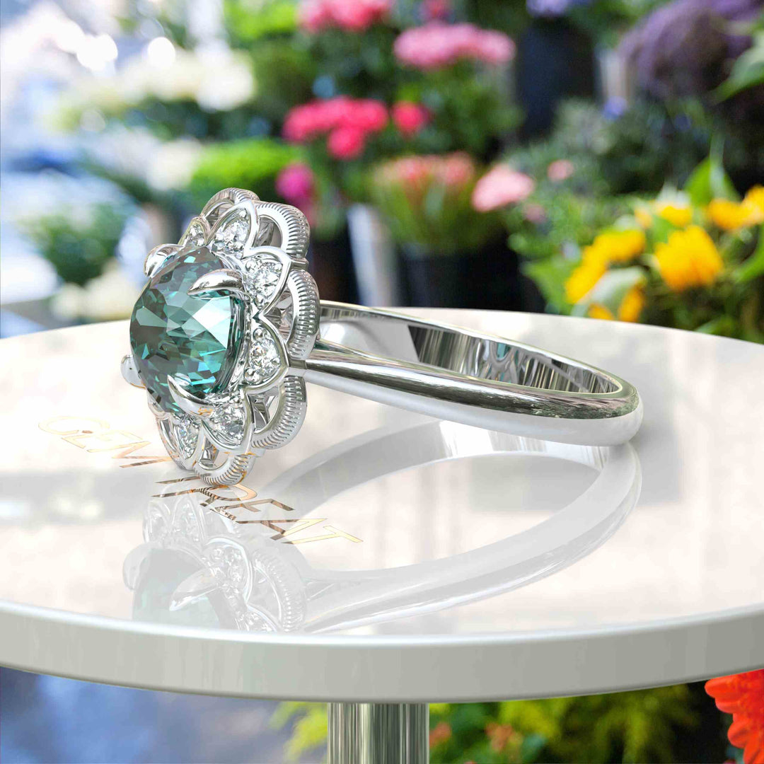 Garden of Glow: Floral Style Halo Ring with Dazzling Portuguese Cut Cyan Blue Moissanite in Silver