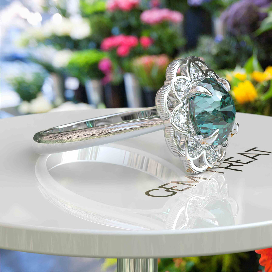 Garden of Glow: Floral Style Halo Ring with Dazzling Portuguese Cut Cyan Blue Moissanite in Silver