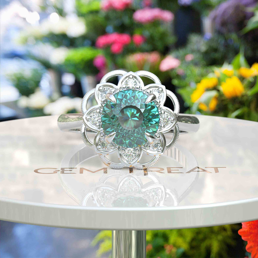 Garden of Glow: Floral Style Halo Ring with Dazzling Portuguese Cut Cyan Blue Moissanite in Silver