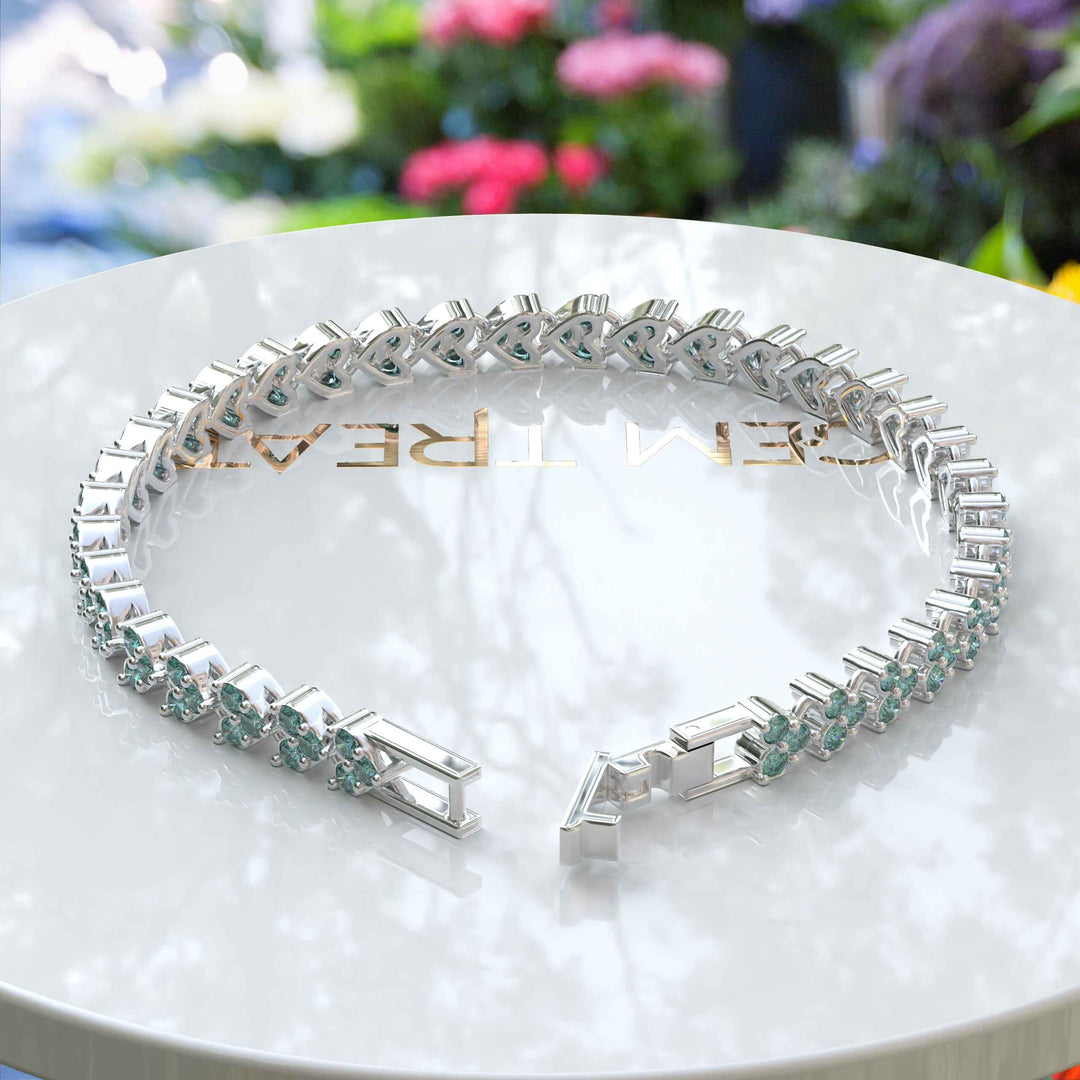 Glistening Sea: Cyan Moissanite Chain Bracelet Splendor