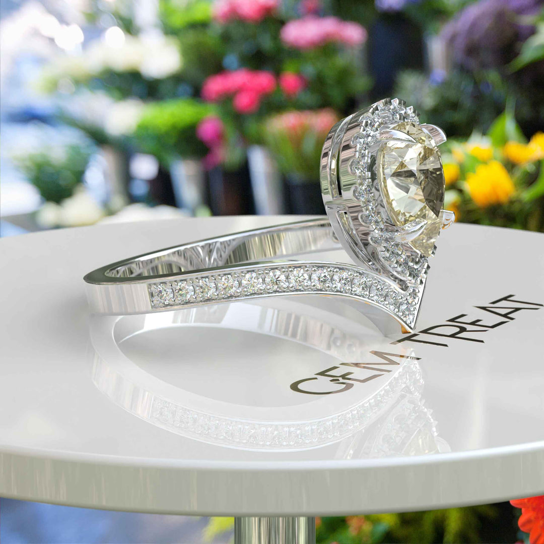 Harvest Glow: Pear-Shaped Yellow Moissanite Halo Engagement Ring in Timeless Silver Design