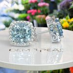 Load image into Gallery viewer, Crystal Marine Majesty: Aquamarine Cushion Stud Earrings with Moissanite Halo Sparkle
