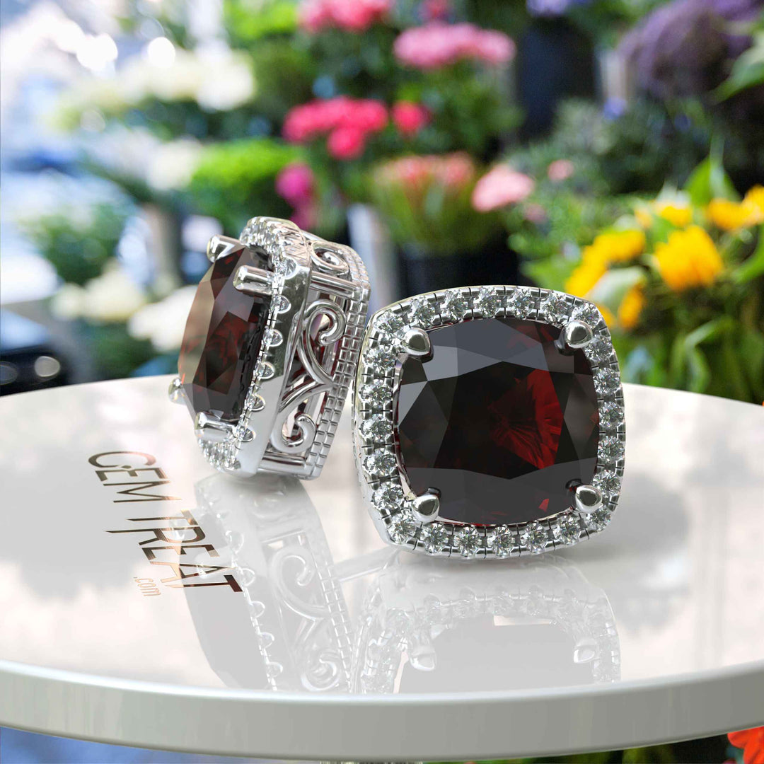 Crimson Allure: Cushion Cut Garnet Stud Earrings with Moissanite Halo.