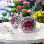 Load image into Gallery viewer, Rosy Radiance: Cushion Pink Sapphire Stud Earrings, Glimmering Moissanite Halo.
