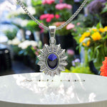 Load image into Gallery viewer, Enchanted Seas: Oval Cut Blue Sapphire Pendant Necklace Adorned with Glistening Moissanite Halo
