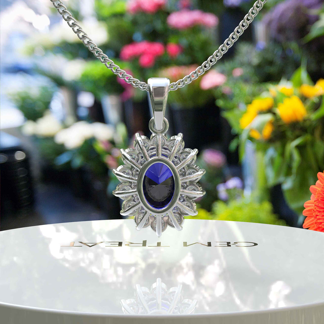 Enchanted Seas: Oval Cut Blue Sapphire Pendant Necklace Adorned with Glistening Moissanite Halo