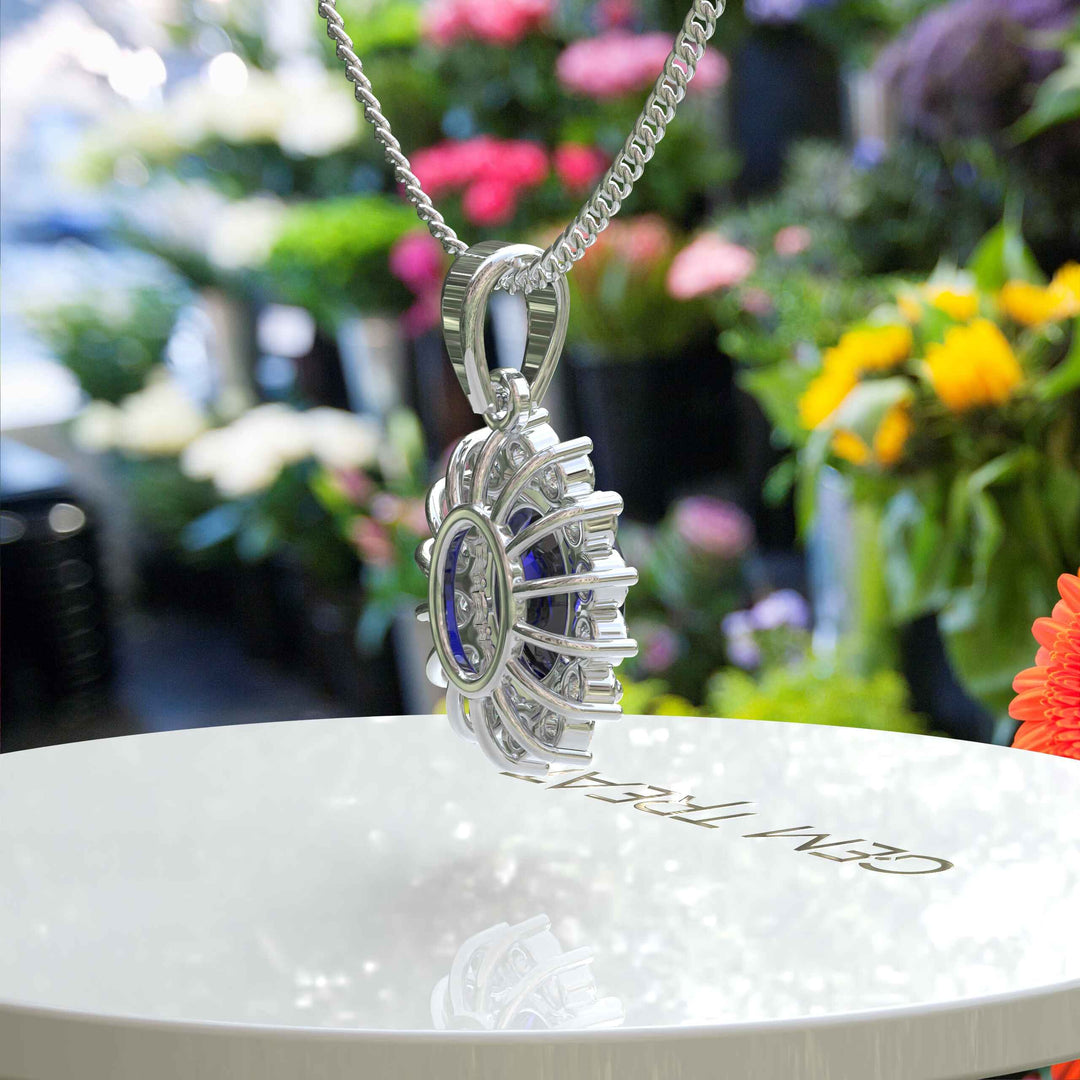 Enchanted Seas: Oval Cut Blue Sapphire Pendant Necklace Adorned with Glistening Moissanite Halo