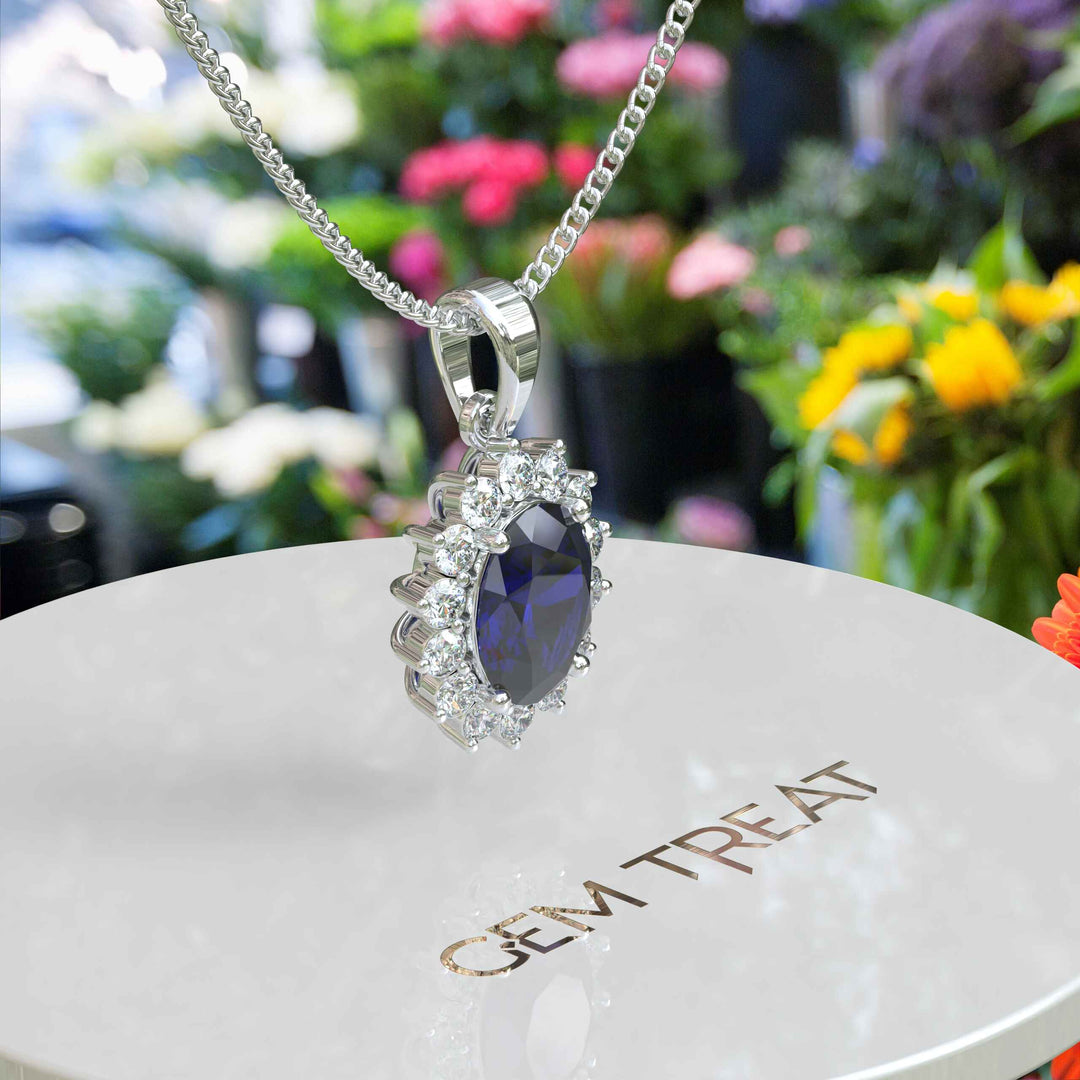 Enchanted Seas: Oval Cut Blue Sapphire Pendant Necklace Adorned with Glistening Moissanite Halo