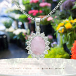 Load image into Gallery viewer, Feminine Mystique: Oval-Cut Rose Quartz Pendant Necklace with Sparkling Moissanite Halo
