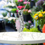 Load image into Gallery viewer, Feminine Mystique: Oval-Cut Rose Quartz Pendant Necklace with Sparkling Moissanite Halo
