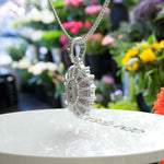 Load image into Gallery viewer, Feminine Mystique: Oval-Cut Rose Quartz Pendant Necklace with Sparkling Moissanite Halo
