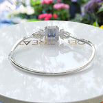 Load image into Gallery viewer, Artisan Crafted 4.0ct Blue Moissanite Bangle Bracelet in Emerald Cut
