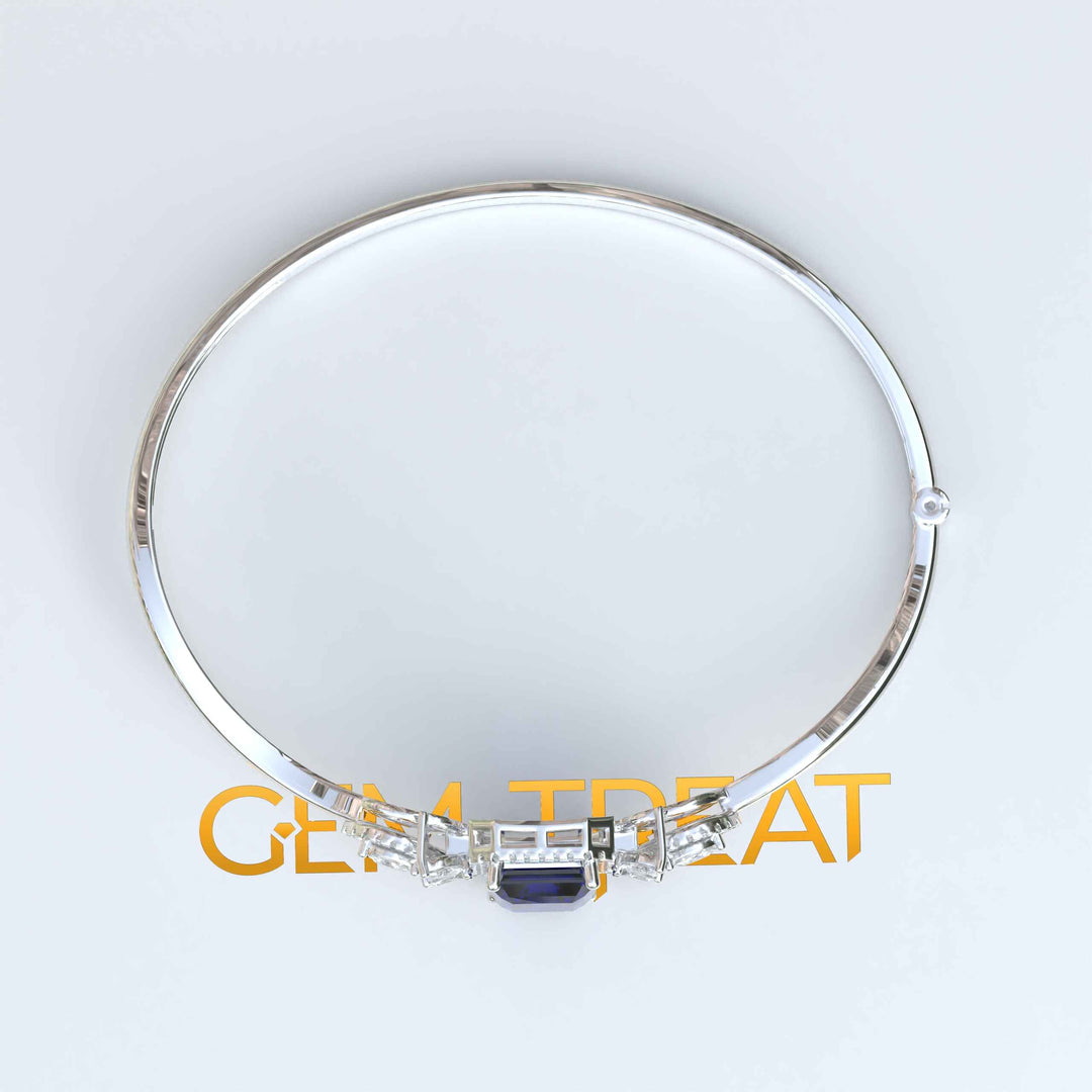 Elegance Unleashed: 4.0ct Emerald Cut Blue Sapphire Bangle Bracelet Radiance