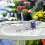 Load image into Gallery viewer, Elegance Unleashed: 4.0ct Emerald Cut Blue Sapphire Bangle Bracelet Radiance
