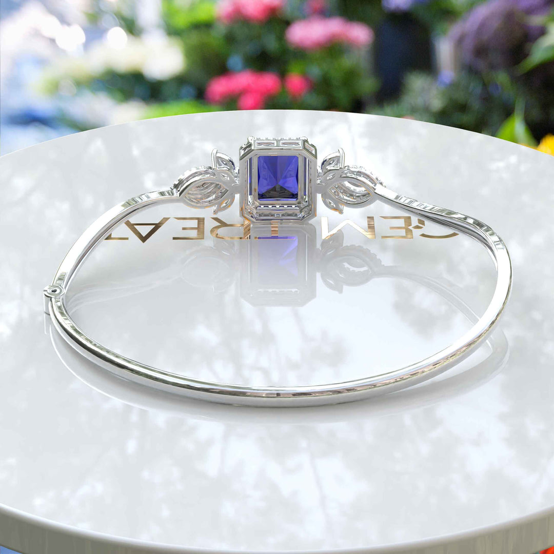 Elegance Unleashed: 4.0ct Emerald Cut Blue Sapphire Bangle Bracelet Radiance