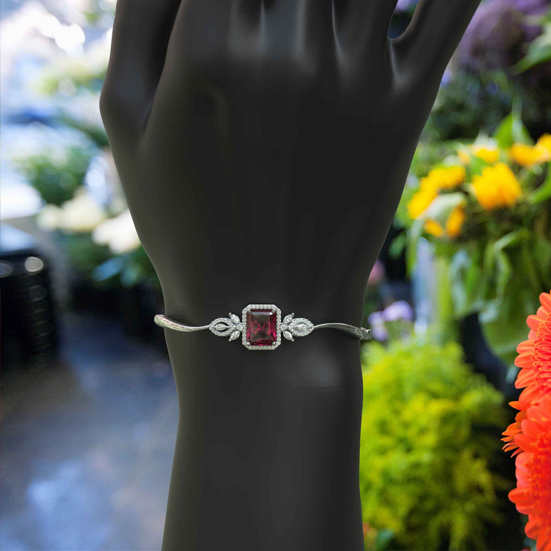 Red Radiance: Emerald Cut Ruby Bangle Bracelet with Glistening Marquise Moissanite Accents