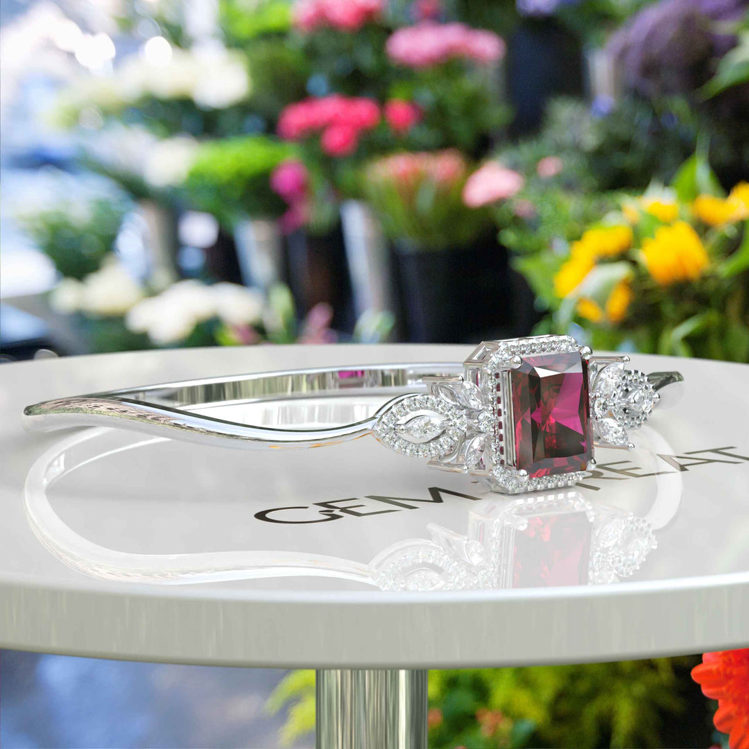 Red Radiance: Emerald Cut Ruby Bangle Bracelet with Glistening Marquise Moissanite Accents