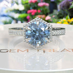 Load image into Gallery viewer, Elegance Defined: Round Blue Moissanite Centerpiece in Stunning Engagement Ring
