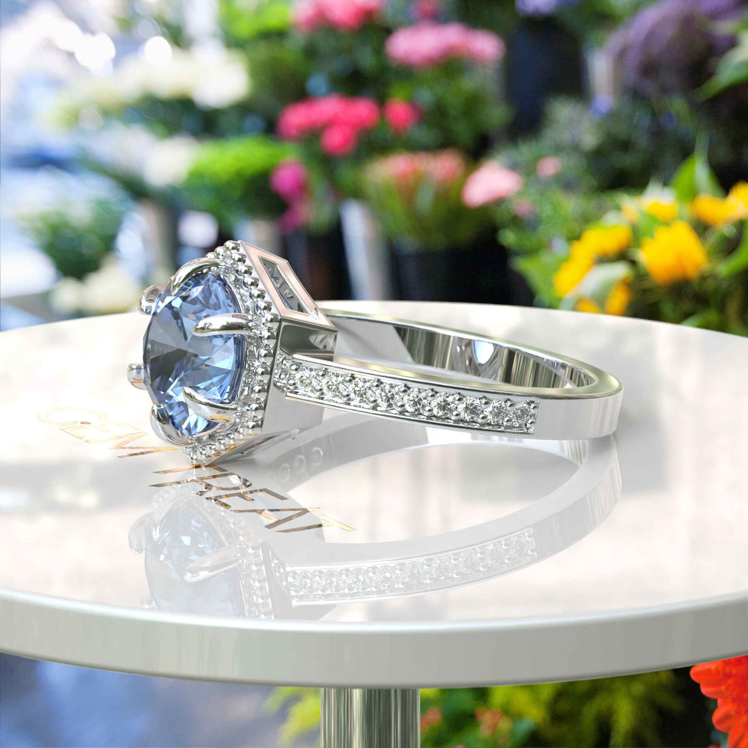 Elegance Defined: Round Blue Moissanite Centerpiece in Stunning Engagement Ring