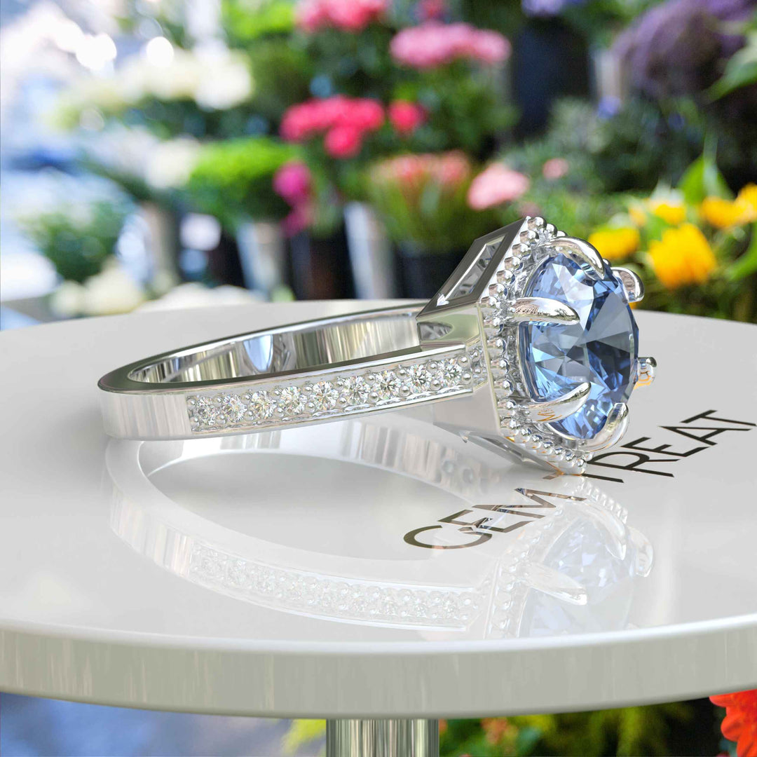 Elegance Defined: Round Blue Moissanite Centerpiece in Stunning Engagement Ring