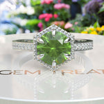 Load image into Gallery viewer, August&#39;s Elegance: Circular Peridot Ring Set in Miligrain-Edged Halo
