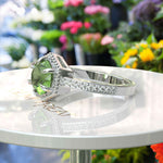 Load image into Gallery viewer, August&#39;s Elegance: Circular Peridot Ring Set in Miligrain-Edged Halo
