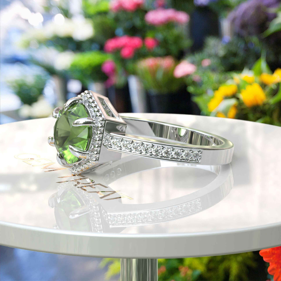 August's Elegance: Circular Peridot Ring Set in Miligrain-Edged Halo