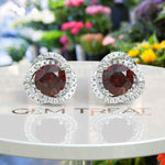 Load image into Gallery viewer, Regal Radiance: Garnet Earrings in Halo Design with Glistening Moissanite Accents.
