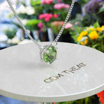 Load image into Gallery viewer, Vivid Splendor: Captivating Round Peridot Solitaire Pendant Necklace, Pure Elegance
