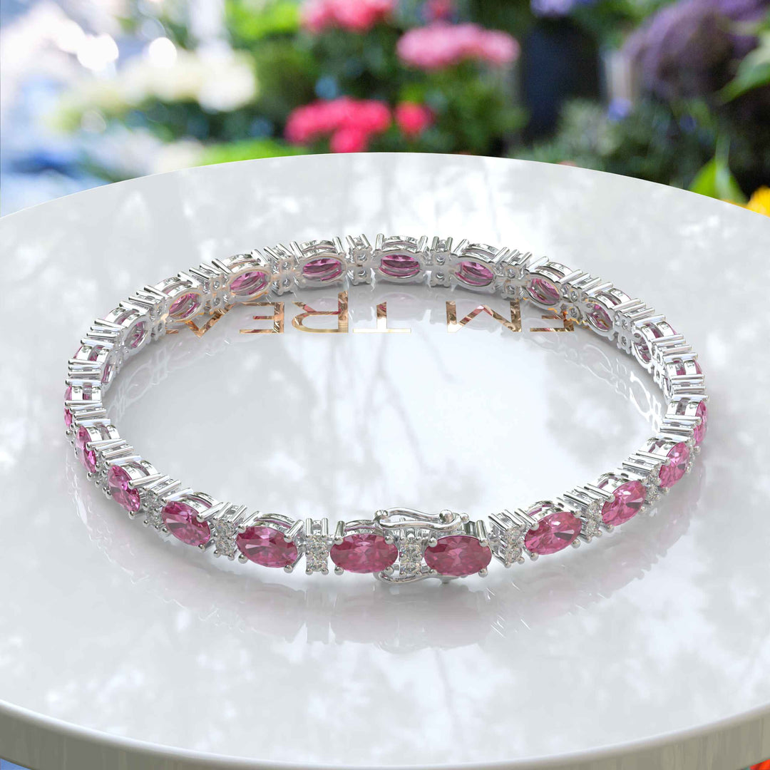 Glistening Array: Oval Pink Sapphire Tennis Bracelet with Alternating Moissanites