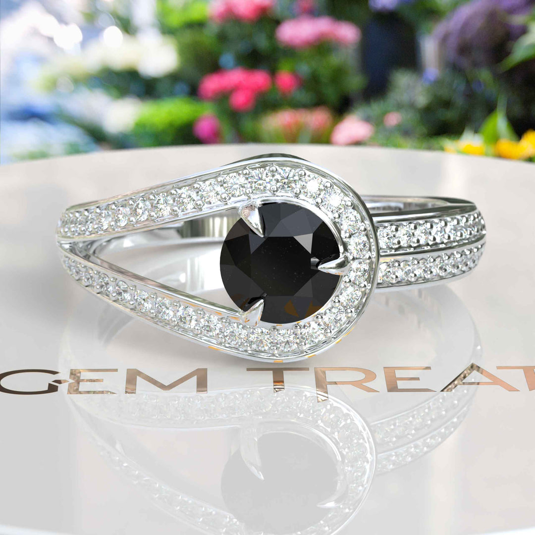 Dark Majesty: Circular Black Onyx Ring Framed by Dazzling Moissanite Halo