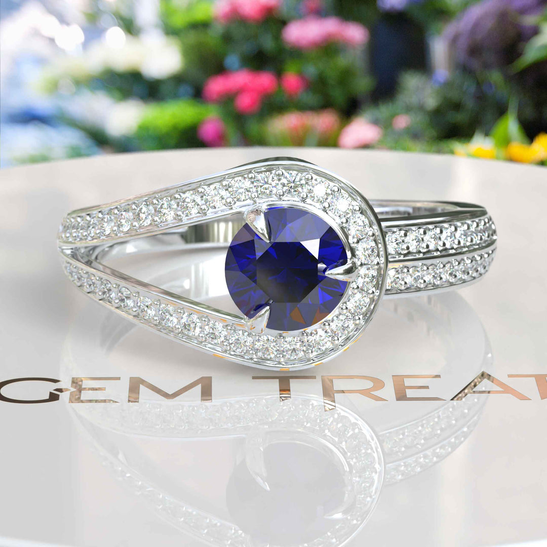 Silver Brilliance with Round Halo Blue Sapphire: An Enchanting Ring Design