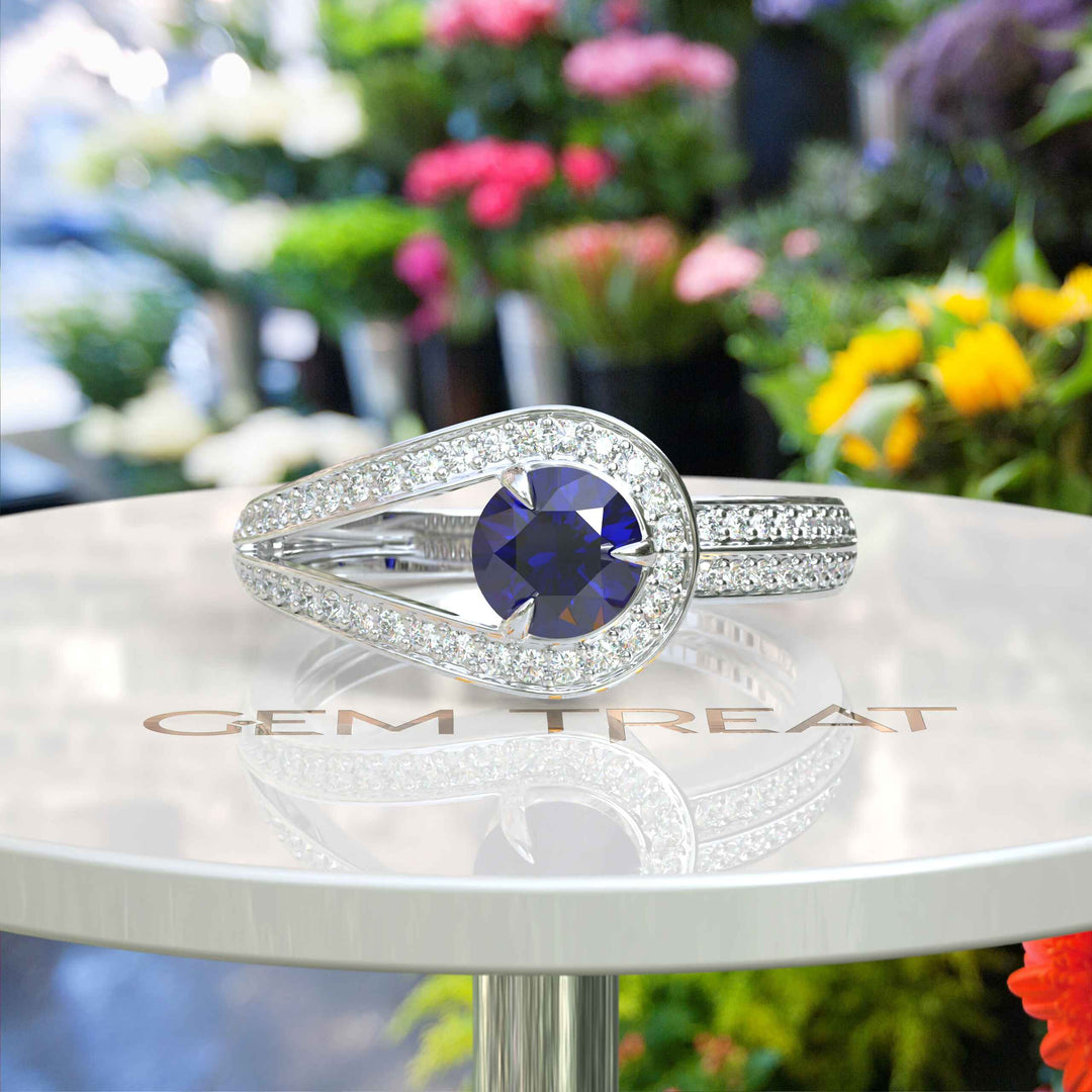 Silver Brilliance with Round Halo Blue Sapphire: An Enchanting Ring Design