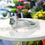 Load image into Gallery viewer, Verdant Elegance: Round Green Emerald Halo Ring
