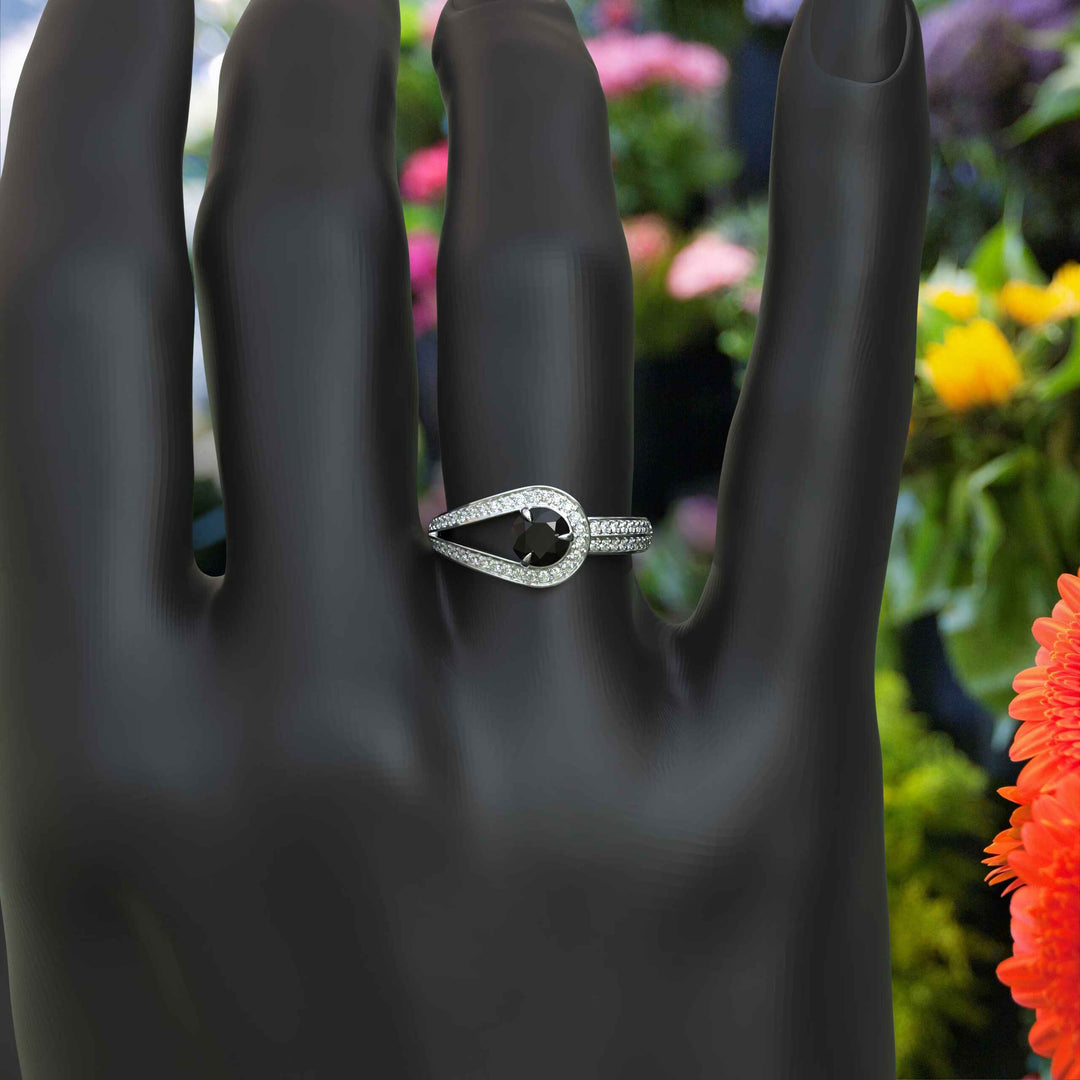 Dark Majesty: Circular Black Onyx Ring Framed by Dazzling Moissanite Halo