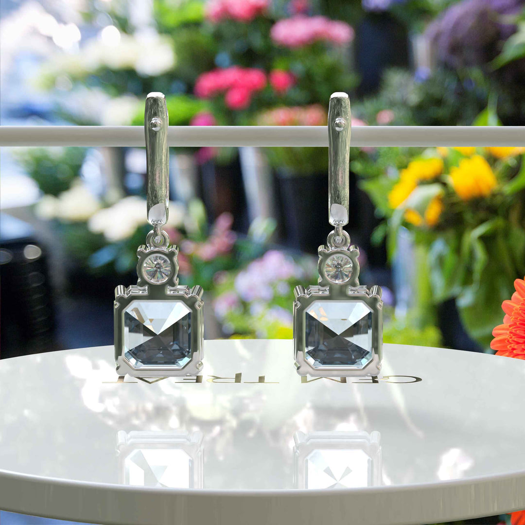 Blue Rhapsody: 10.0ct Asscher Cut Aquamarine Earrings in a Graceful Drop.