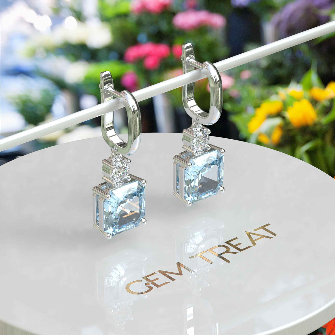 Blue Rhapsody: 10.0ct Asscher Cut Aquamarine Earrings in a Graceful Drop.