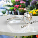 Load image into Gallery viewer, Timeless Elegance: Pear-Shaped Champagne Moissanite Halo Ring
