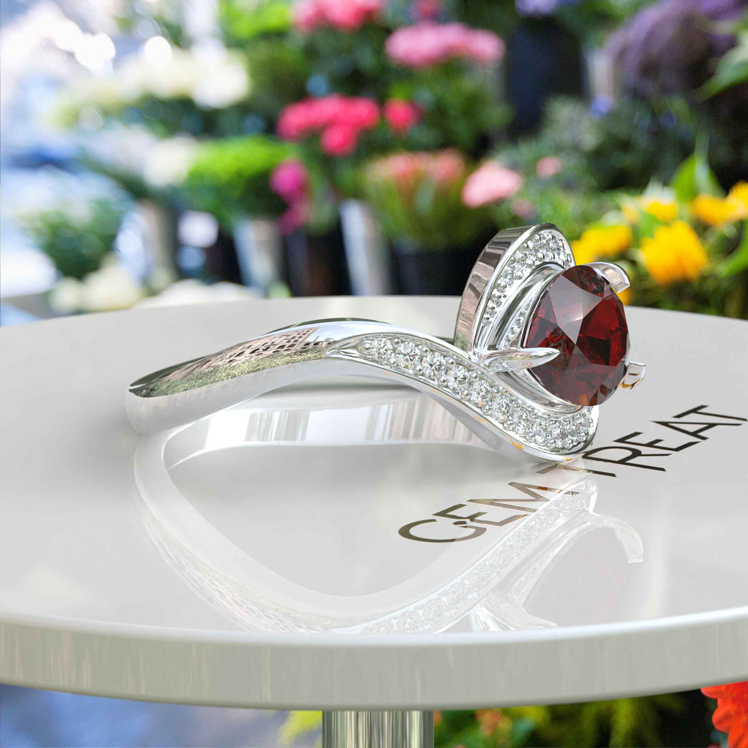 A Symphony in Red: Pear Cut Garnet Silver Halo Ring