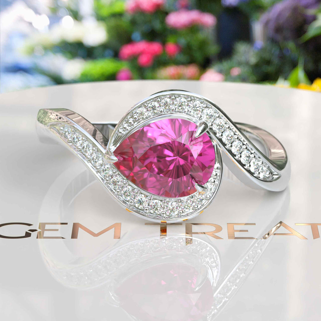 Elegance Redefined: Dive into the Halo Pear Cut Pink Sapphire Ring's Charm