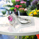 Load image into Gallery viewer, Elegance Redefined: Dive into the Halo Pear Cut Pink Sapphire Ring&#39;s Charm
