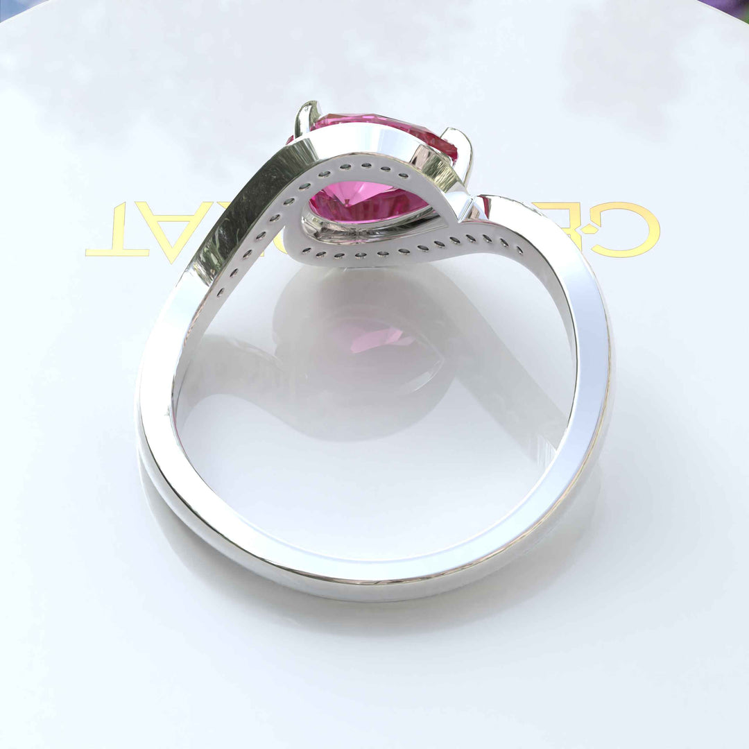 Elegance Redefined: Dive into the Halo Pear Cut Pink Sapphire Ring's Charm