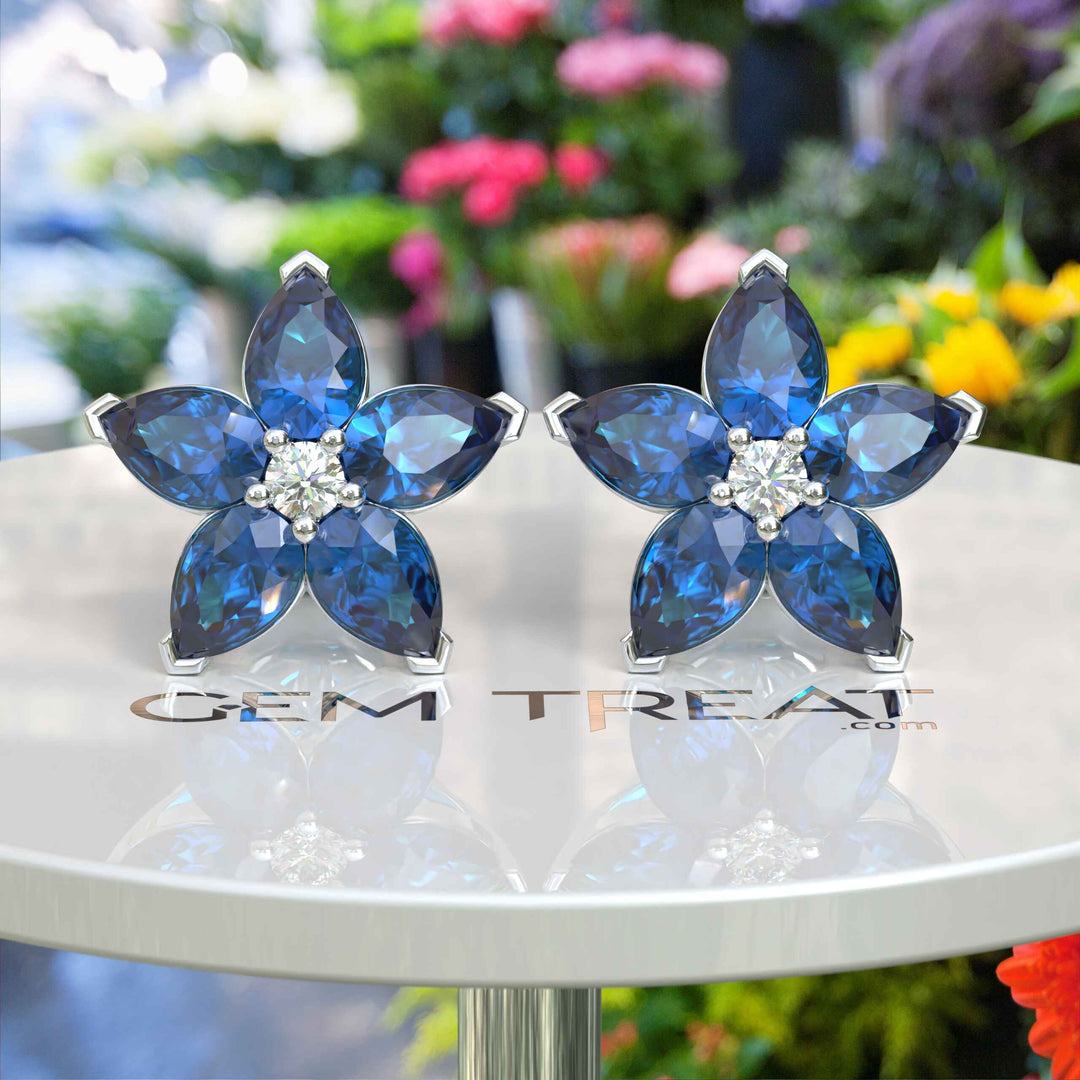 Celestial Beauty: Pear Shaped London Blue Topaz Cluster Earrings.