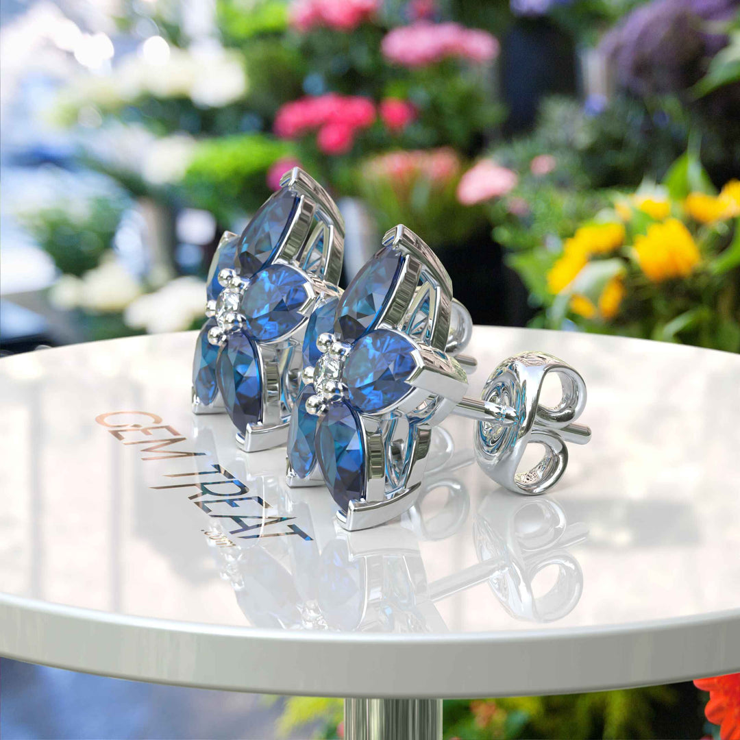 Celestial Beauty: Pear Shaped London Blue Topaz Cluster Earrings.