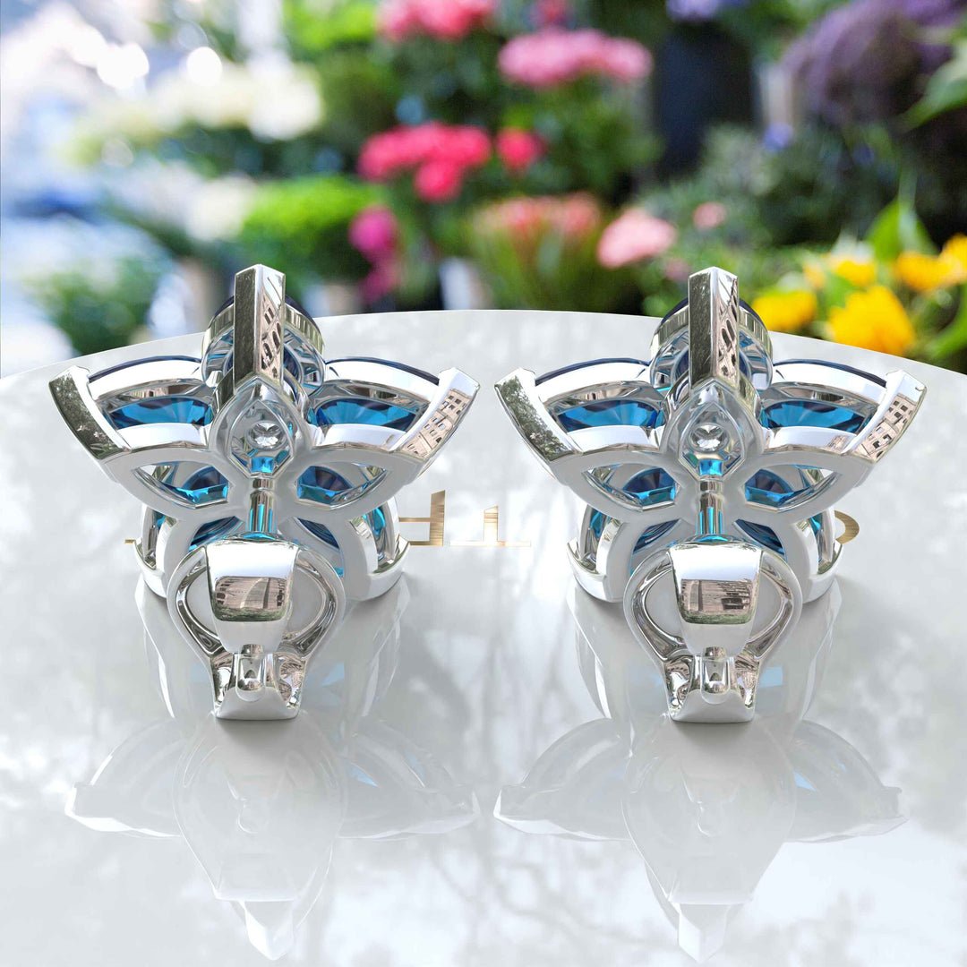 Celestial Beauty: Pear Shaped London Blue Topaz Cluster Earrings.