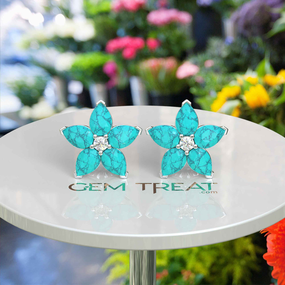 Azure Blossom: Pear Turquoise Gems in Elegant Floral Cluster Earrings.