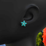 Load image into Gallery viewer, Azure Blossom: Pear Turquoise Gems in Elegant Floral Cluster Earrings.
