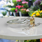 Load image into Gallery viewer, Golden Sunlight Captured: Oval Cut Yellow Sapphire in Solitaire Ring Setting
